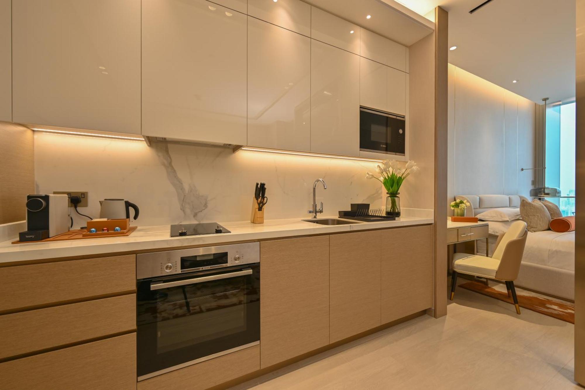 Отель Onyx Rotana Манама Экстерьер фото A kitchen in a serviced apartment in Hong Kong